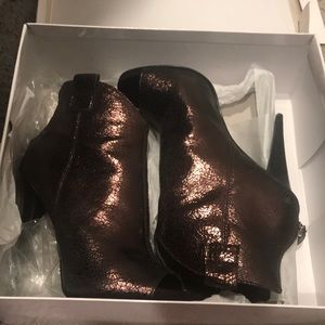 Metalic brown booties.
